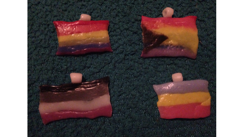 Pride Flag charms made out of InstaMorph moldable plastic.