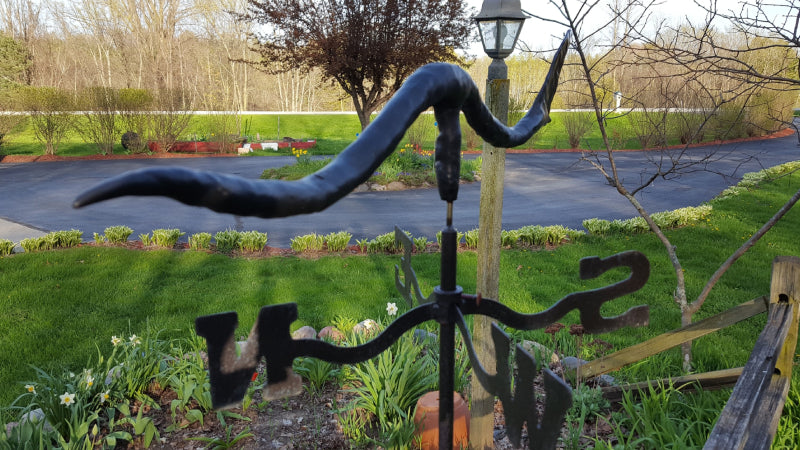 Weathervane arrow made with InstaMorph moldable plastic for outdoor garden.