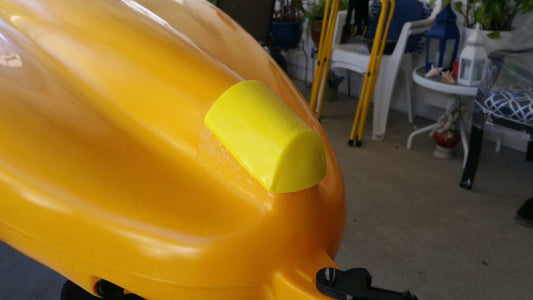 Kayak hull protector made from InstaMorph moldable plastic, made yellow with InstaMorph pigment to match kayak.