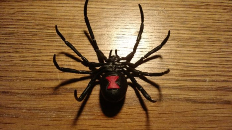 Black widow spider made with InstaMorph moldable plastic. Full spider shown with red hourglass on back.