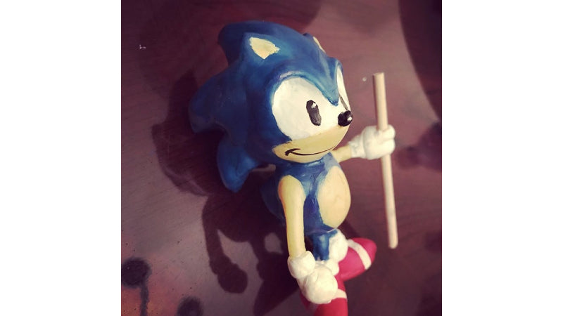 Sonic the Hedgehog SEGA figurine cake topper sculpted with InstaMorph moldable plastic.