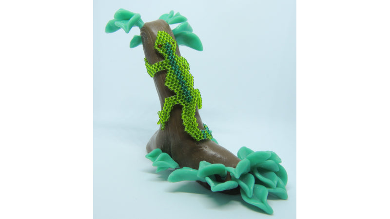 InstaMorph moldable plastic crafted into a tree to make a stand for a beaded lizard for a Christmas gift. 