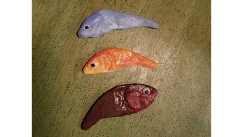 Three little fishies fishing lures made out of InstaMorph moldable plastic.