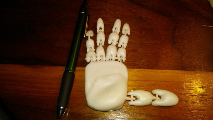 Posable model of hand crafted with InstaMorph moldable plastic.