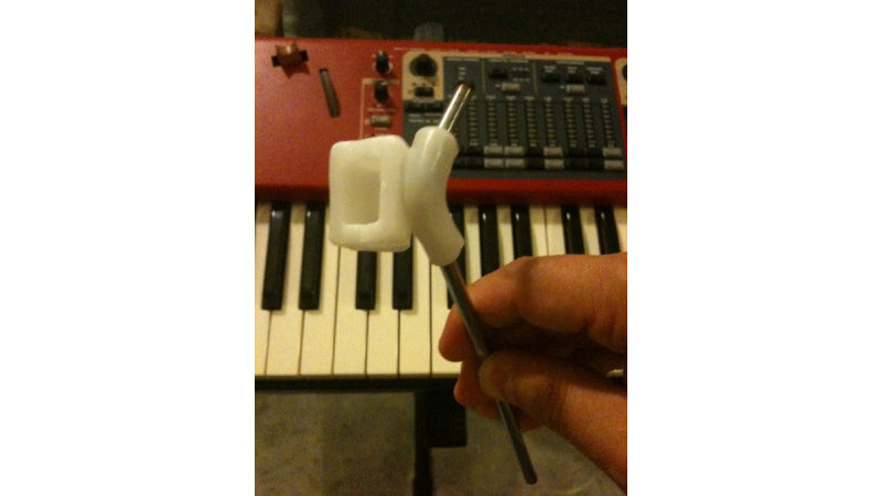 Whammy bar attached to music keyboard with InstaMorph moldable plastic.