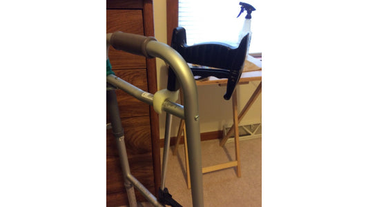Handle mount made with InstaMorph moldable plastic to attach a grabber to a walker after a hospital visit.
