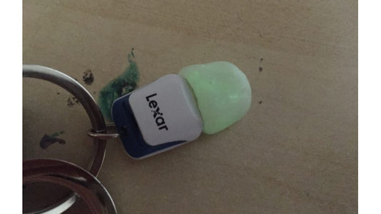 Replacement cap made for USB thumb drive made with InstaMorph moldable plastic, added glow powder to it, shown on a key ring.
